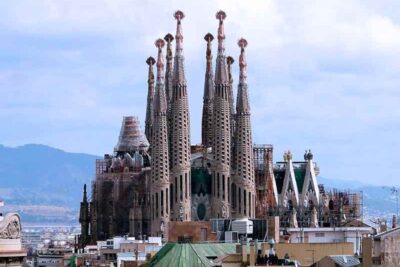 The Majestic Journey from La Sagrada Familia to Barcelona Port